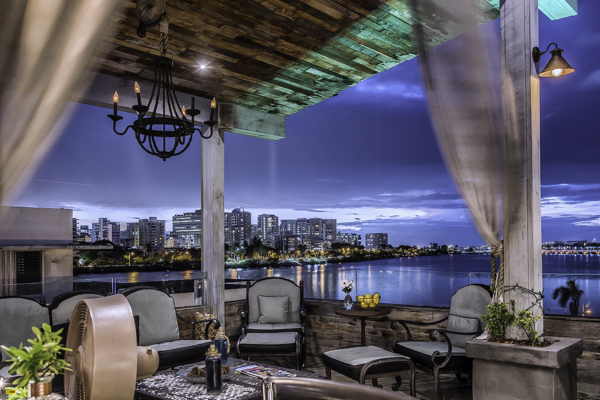O:live Rooftop looks out on the high-rises of Condado and the waters of the Condado Lagoon.