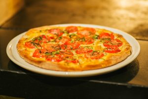 Nordstrom Bazille serves bistro food with contemporary American and Caribbean influences.