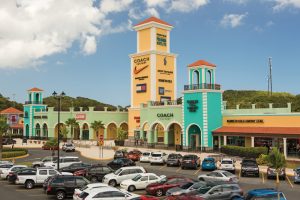 Puerto Rico Premium Outlets, which looks like a colorful country offers big bargains on famous clothing and other accessories.
